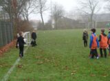 Voetbalpieten bezoeken training S.K.N.W.K. JO9-1 en JO7-1 op zaterdag 4 december 2021 (10/75)